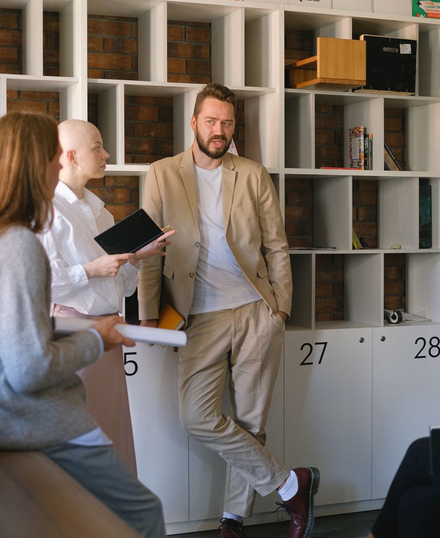 Consultants reviewing commercial evidence together in an office
